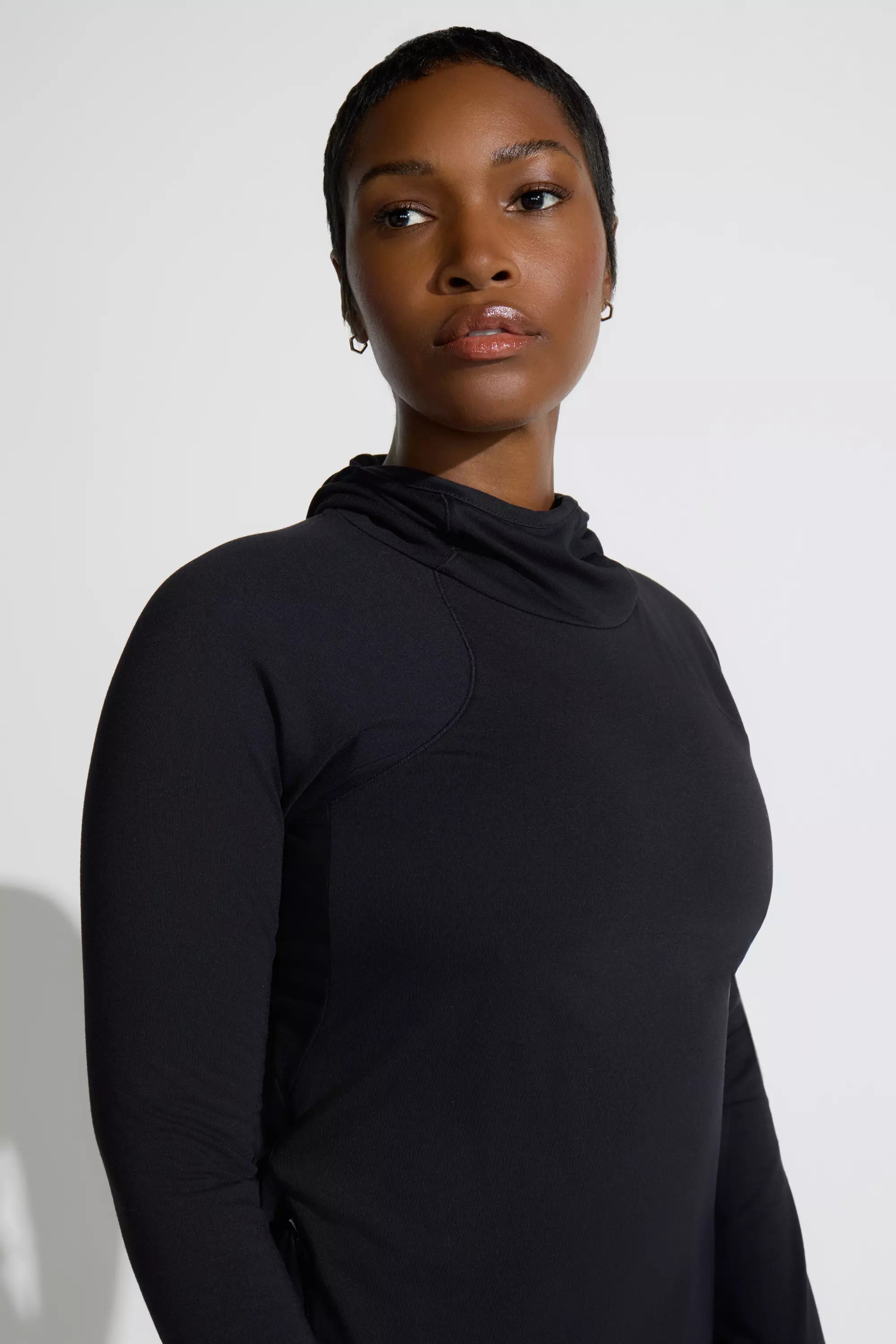 The Soft Stretch GRS Certified Recycled Poly Hooded Top - Black