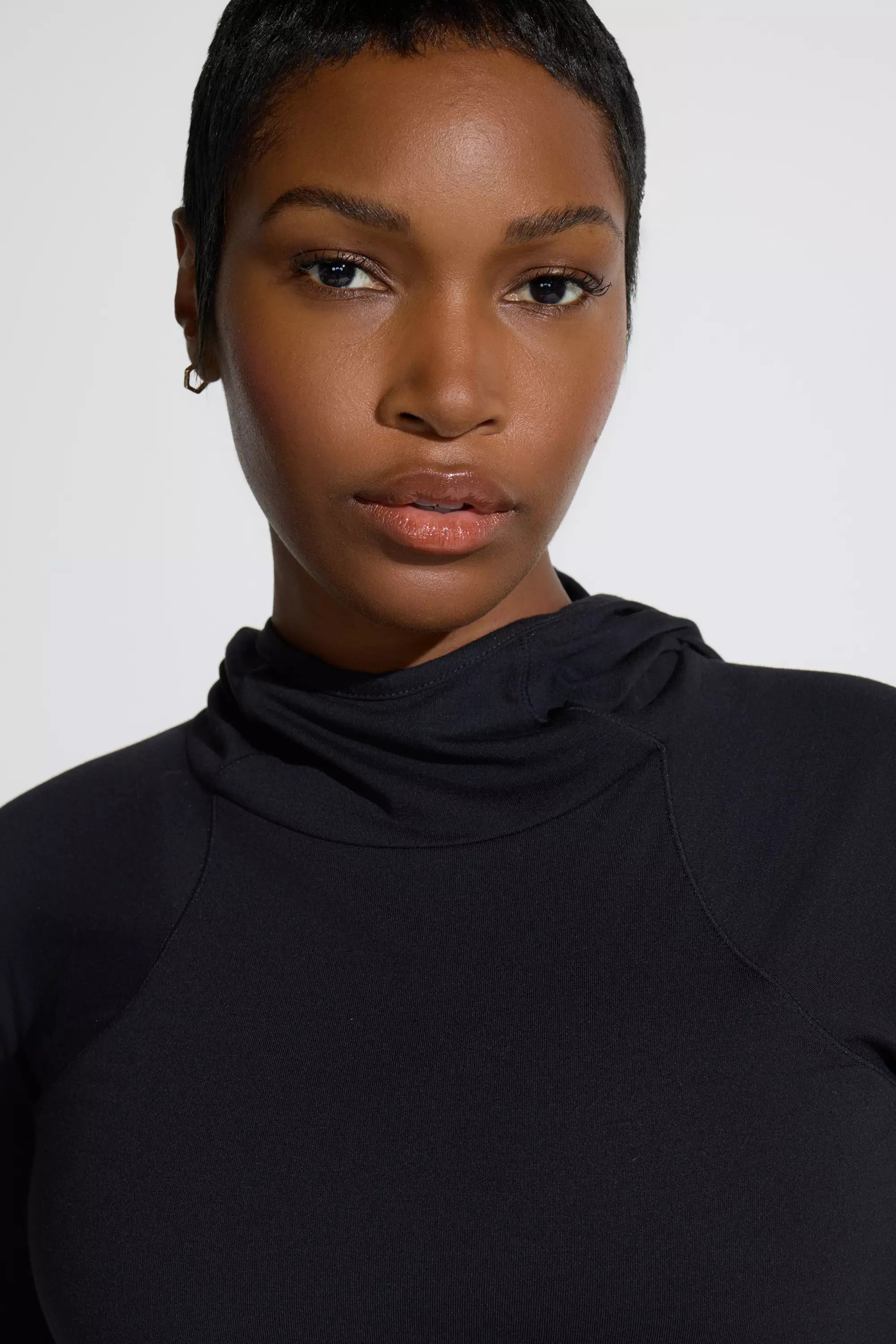 The Soft Stretch GRS Certified Recycled Poly Hooded Top - Black