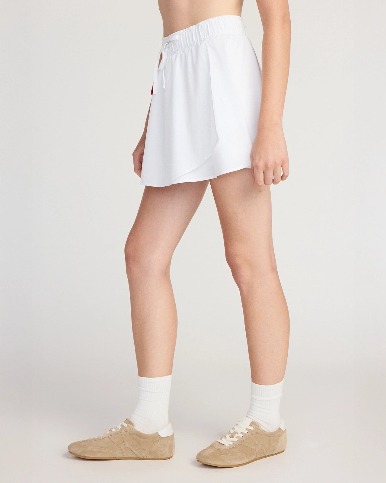 The Tennis + Golf GRS Certified Recycled Polyester Flowy Skort - White