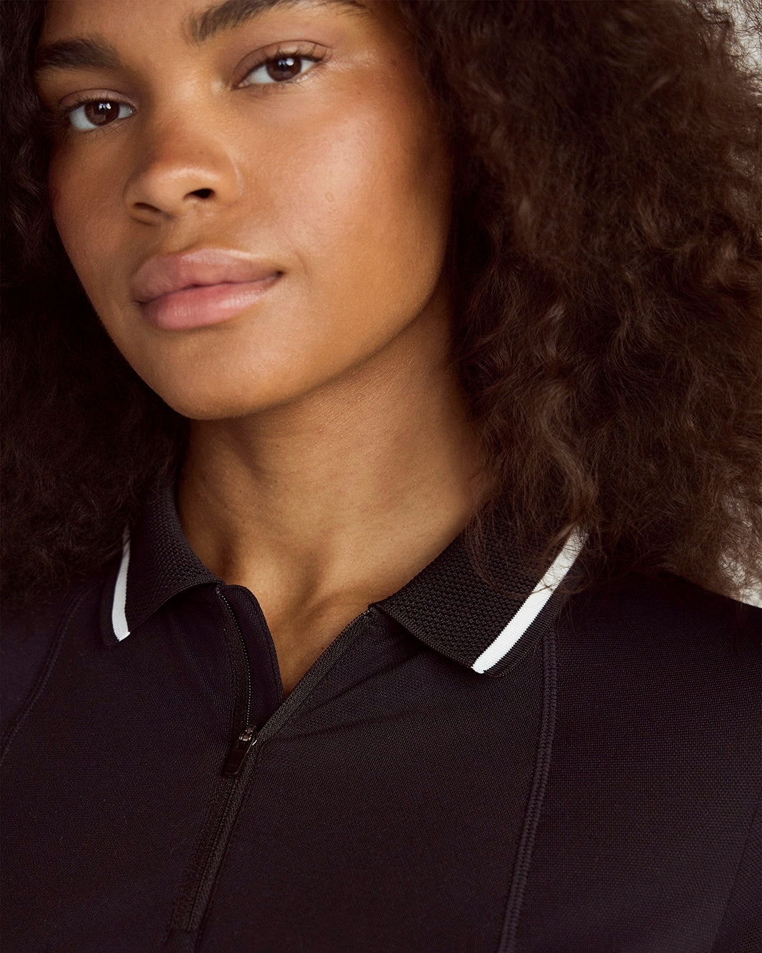 The Stretch Pique GRS Certified Recycled Nylon Polo - Black