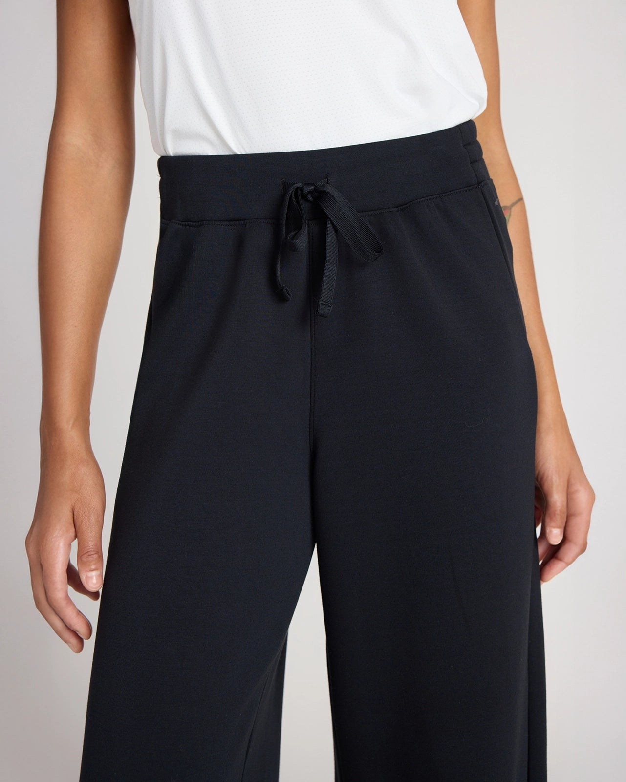 The Light Stretch GRS Certified Recycled Poly + TENCEL™ Modal Wide Leg Pant - Black
