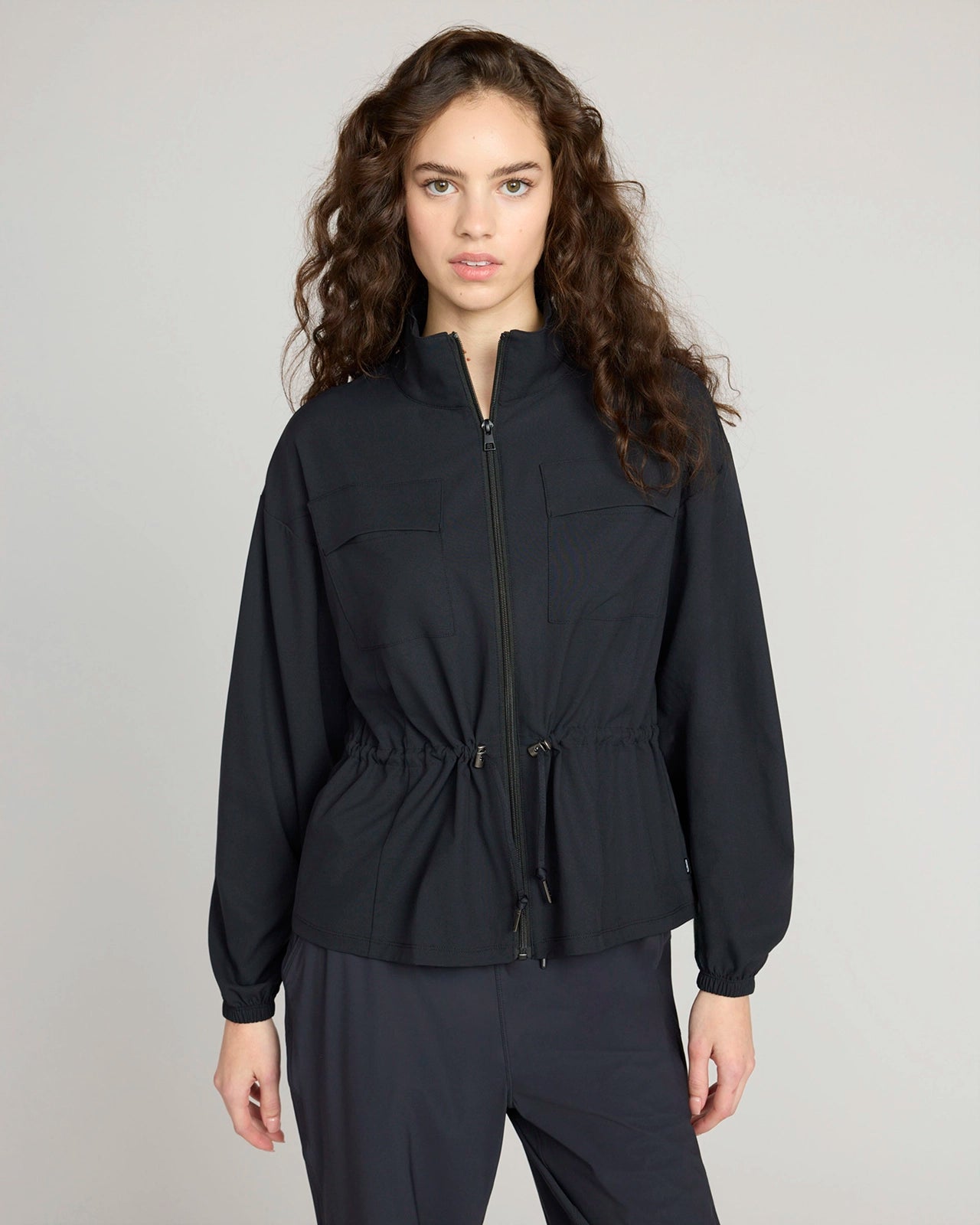 The Travel GRS Certified Recycled Poly Cinched Waist Jacket - Black