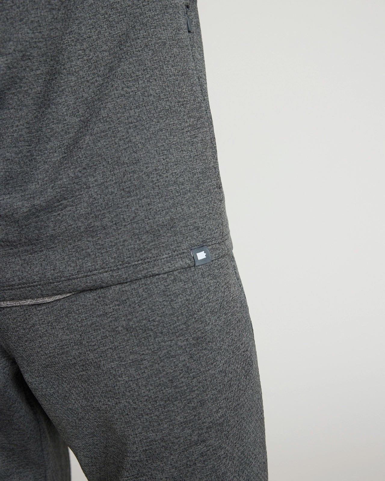 The Active Stretch GRS Certified Recycled Poly Melange 1/4 Zip