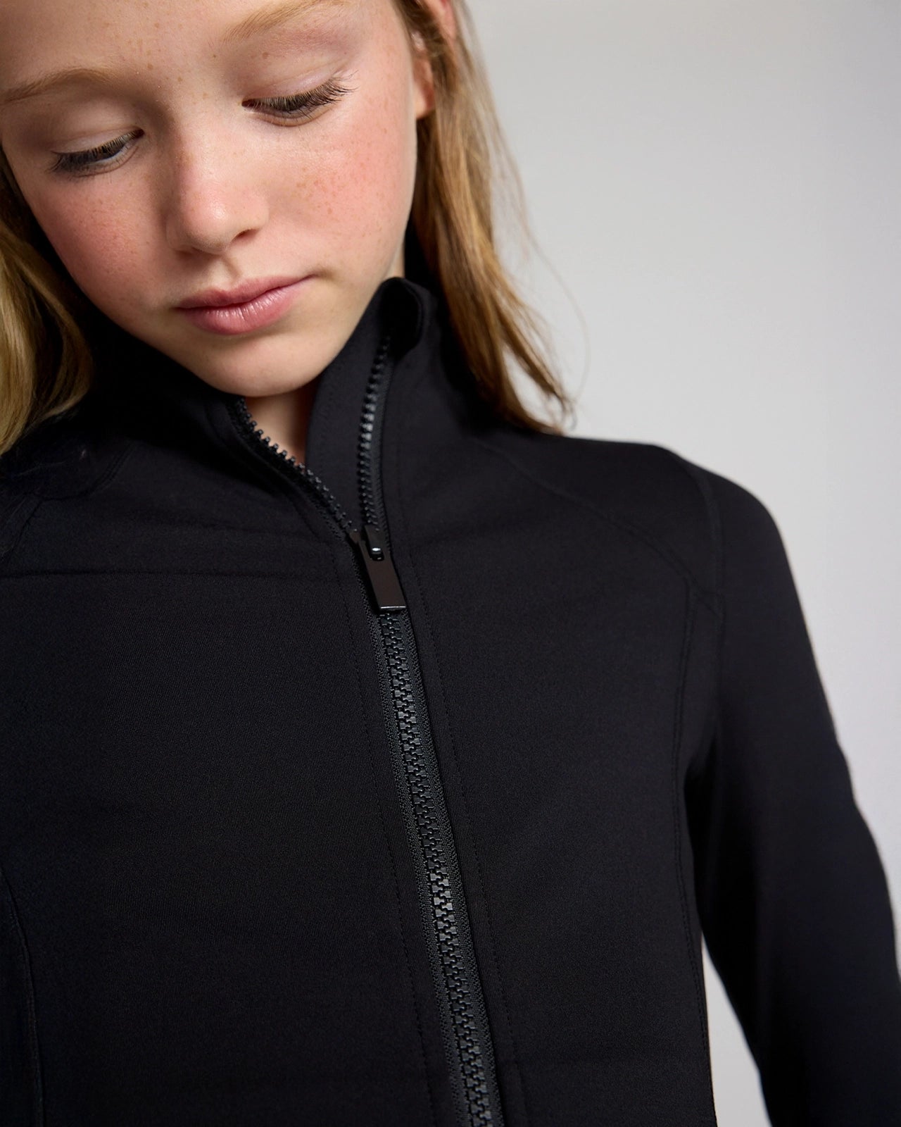 The Girls' Active Stretch GRS Certified Recycled Poly Yoga Jacket - Black