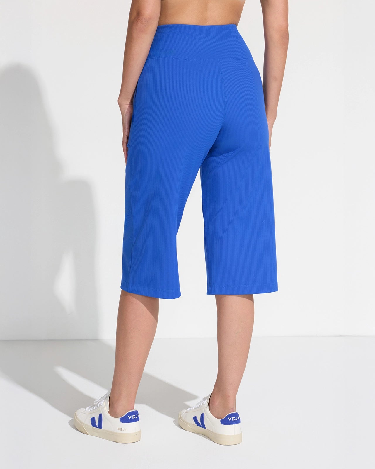 The Soft Luxe Ribbed GRS Certified Recycled Nylon Capri Pant - Surf the Web Blue
