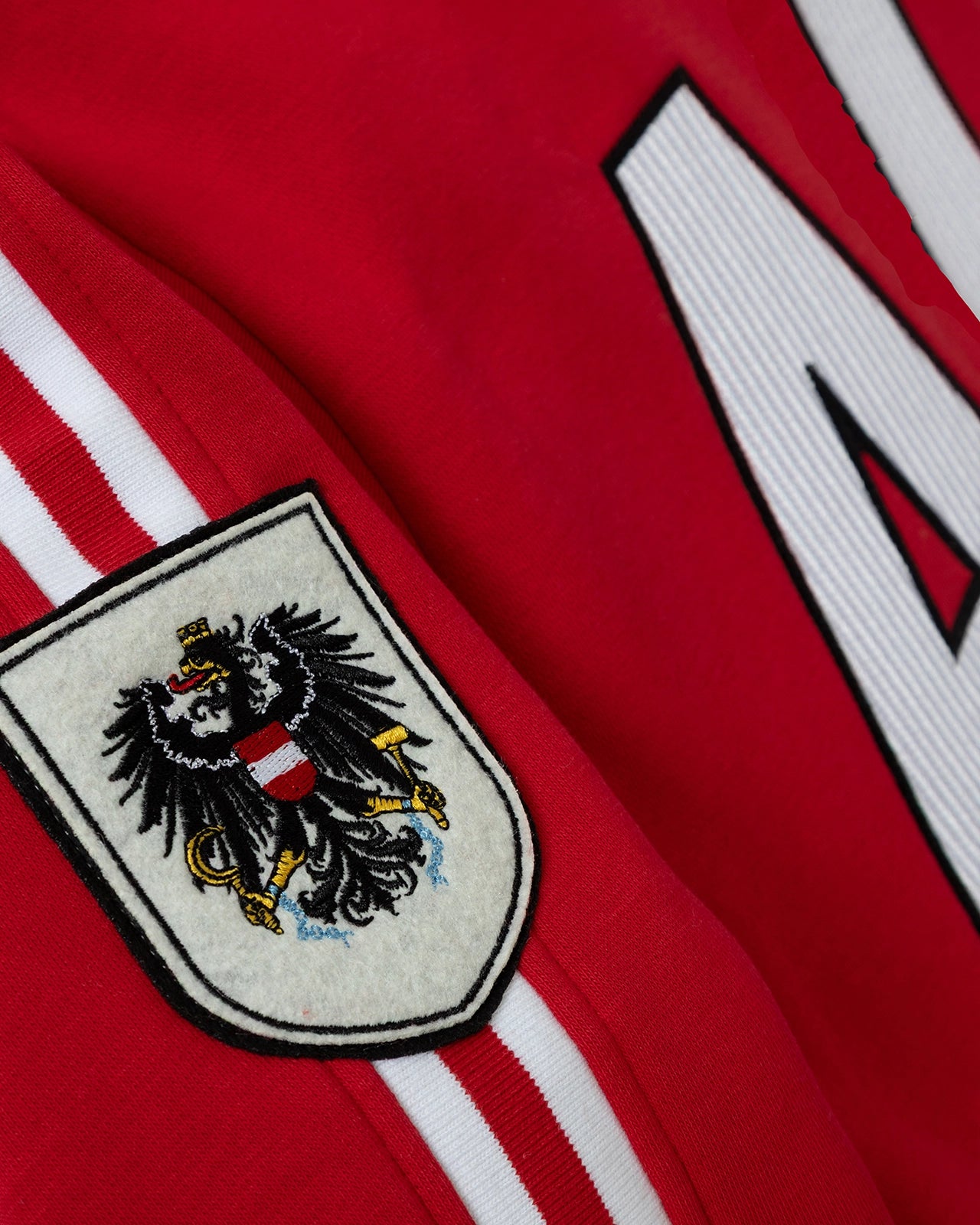 The Breakaway Hoodie - Breakaway Red/Austria