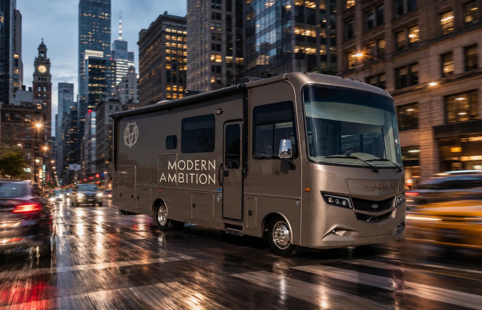Dark metallic grey Precept RV with 'Modern Ambition' branding driving down a busy city street with many skyscrapers both new and old.