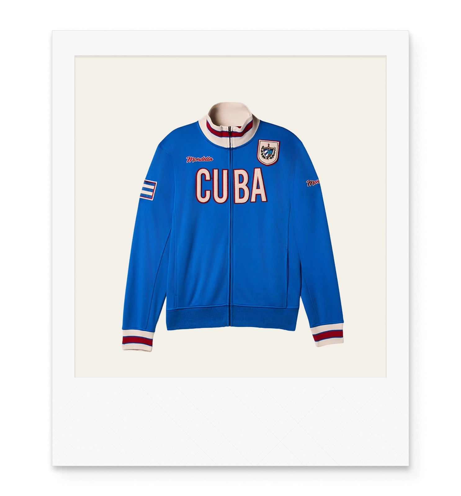 Blue track jacket with 'Cuba' text on the front and the flag on an arm patch.