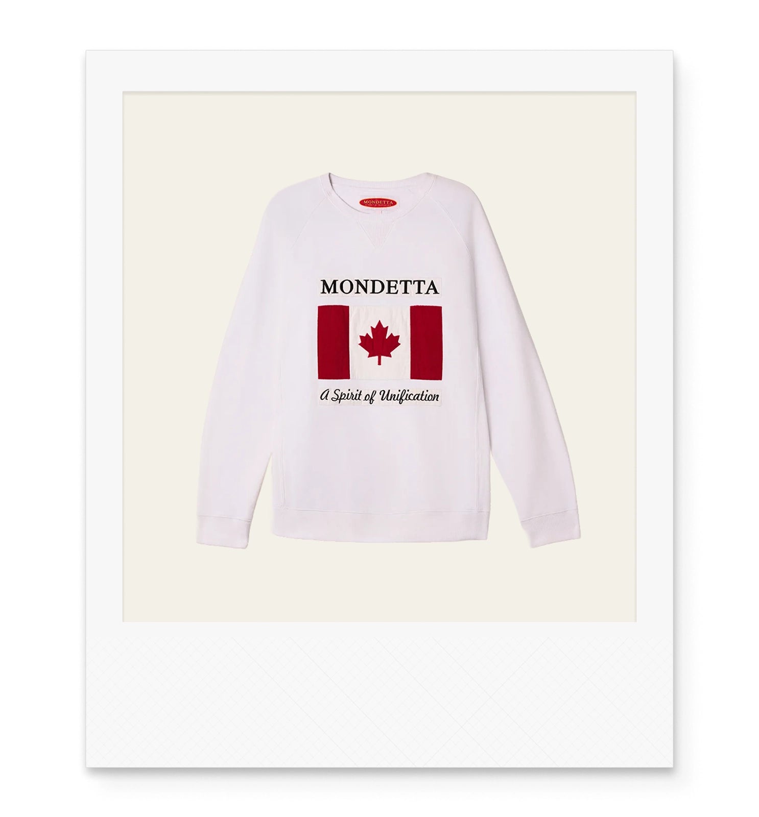 White sweatshirt with 'Mondetta' and a Canadian flag and 'A Spirit of Unification' on the front.