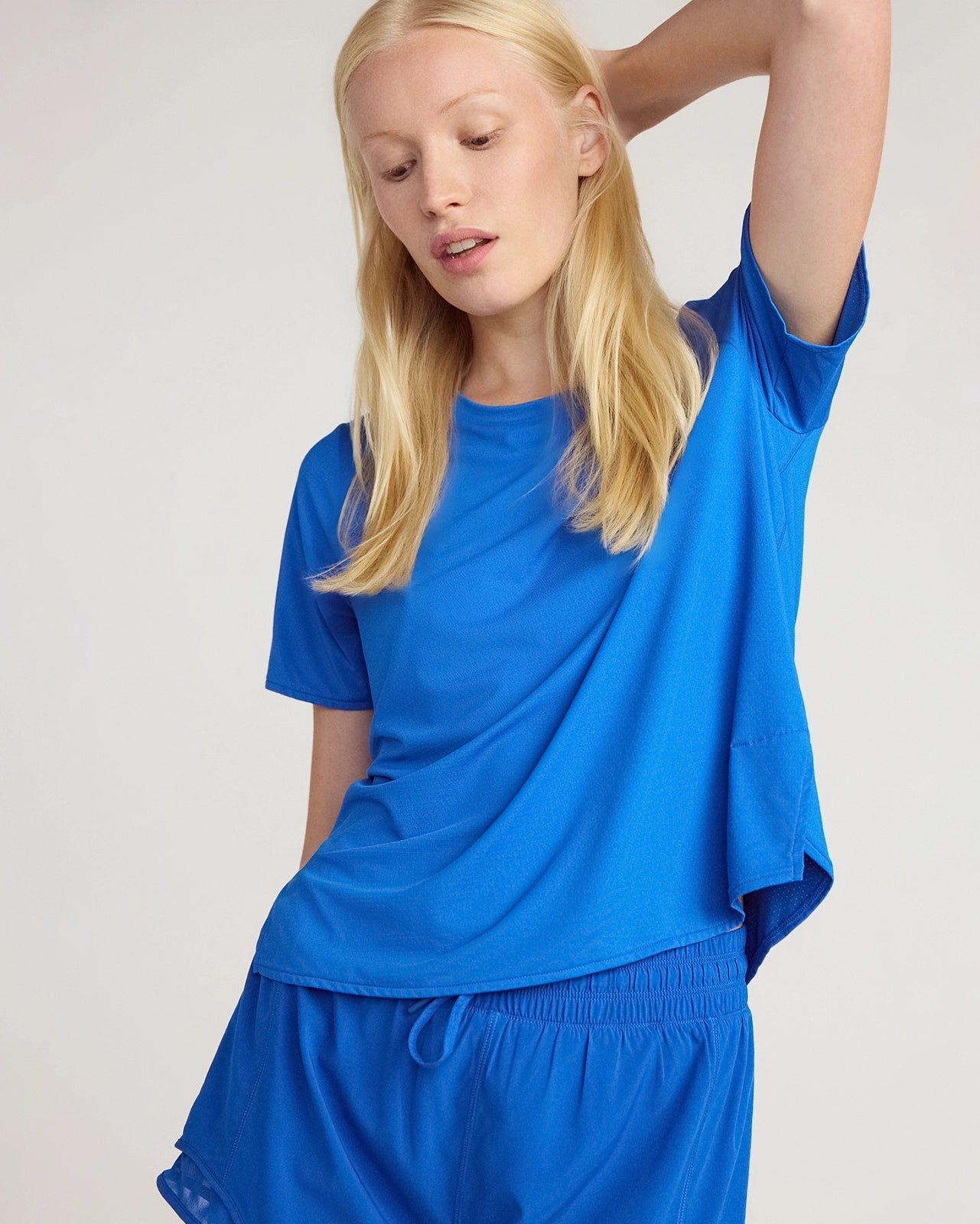 The Active Stretch GRS Certified Recycled Nylon Side Slits Tee - Princess Blue
