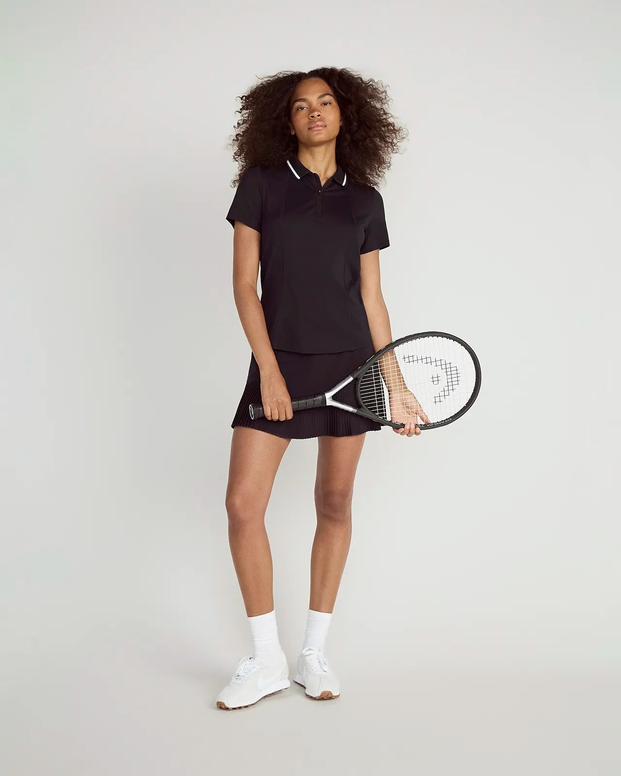 The Stretch Pique GRS Certified Recycled Nylon Polo - Black