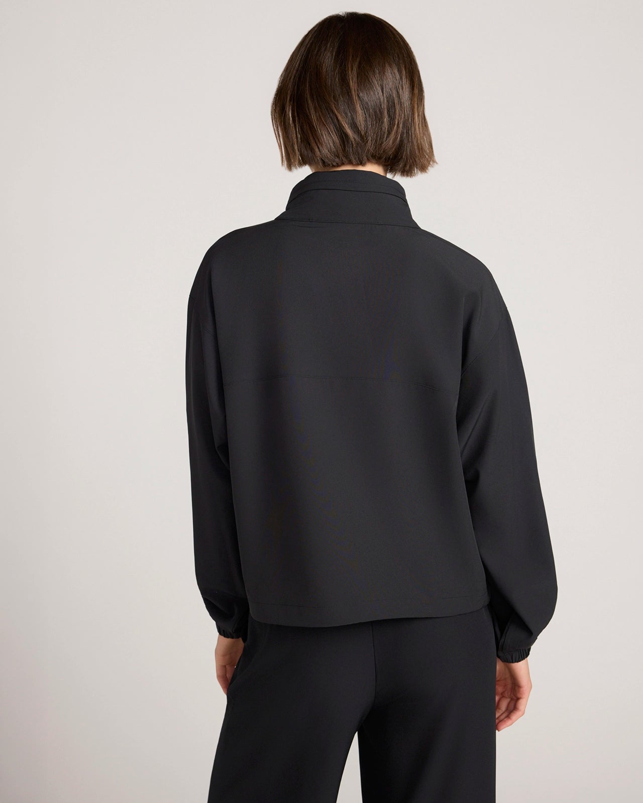 The Stretch Lightweight Run Popover Jacket - Black