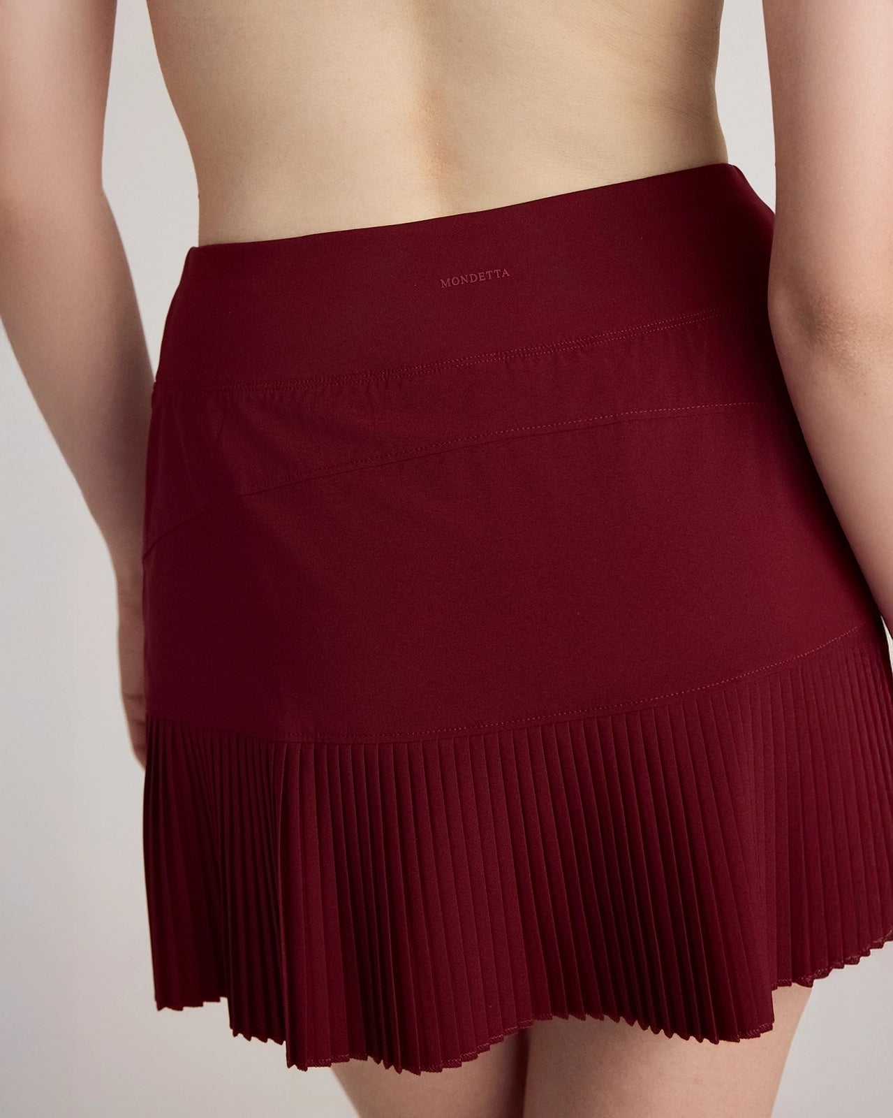 The Pleated Built-In Liner GRS Certified Recycled Polyester Skort - Cabernet