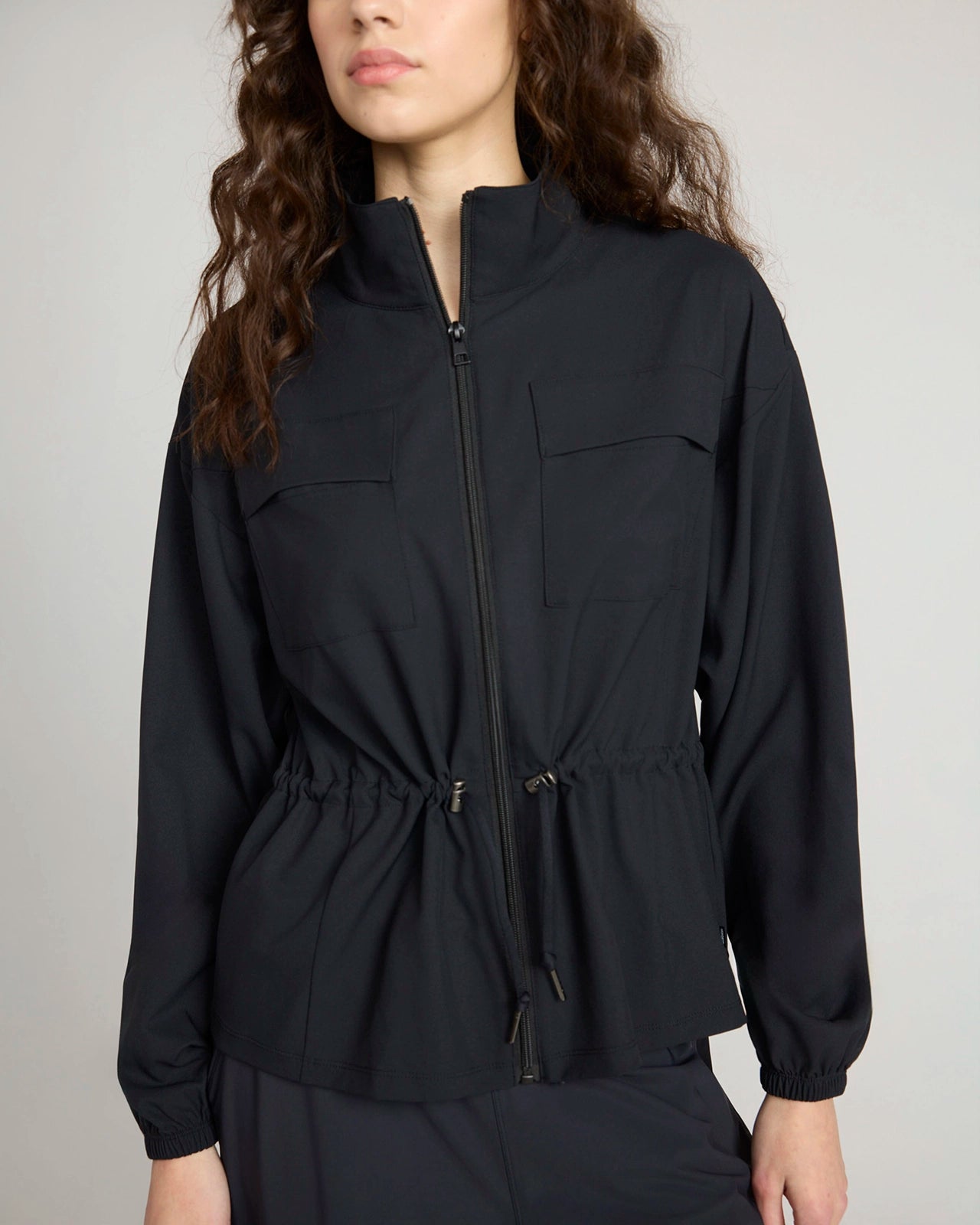 The Travel GRS Certified Recycled Poly Cinched Waist Jacket - Black