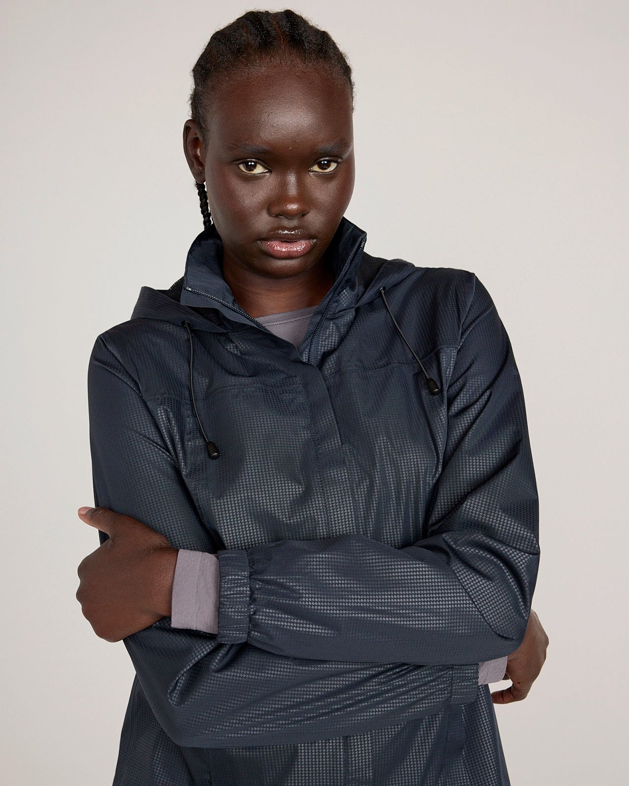 The Travel Embossed Print Rain Jacket - Black