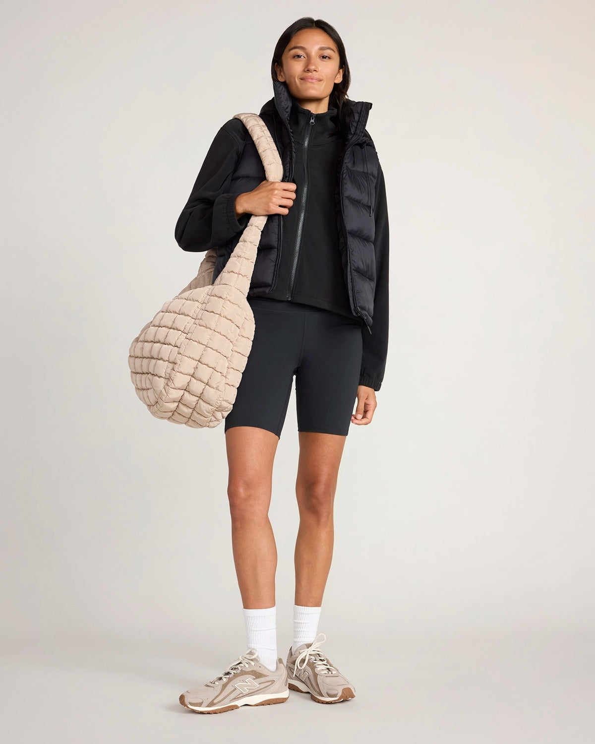 For general description, go to 'Main Product Description' region - The Travel Quilted Hooded Vest - Black