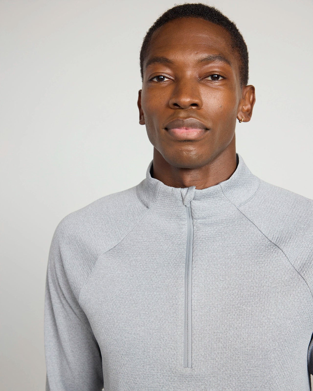 The Active Stretch GRS Certified Recycled Poly Melange 1/4 Zip