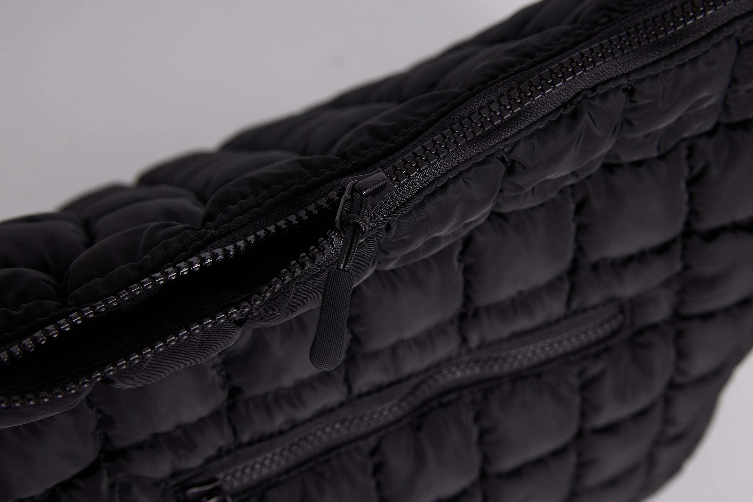 The Quilted Front Zip Tote Bag - Black