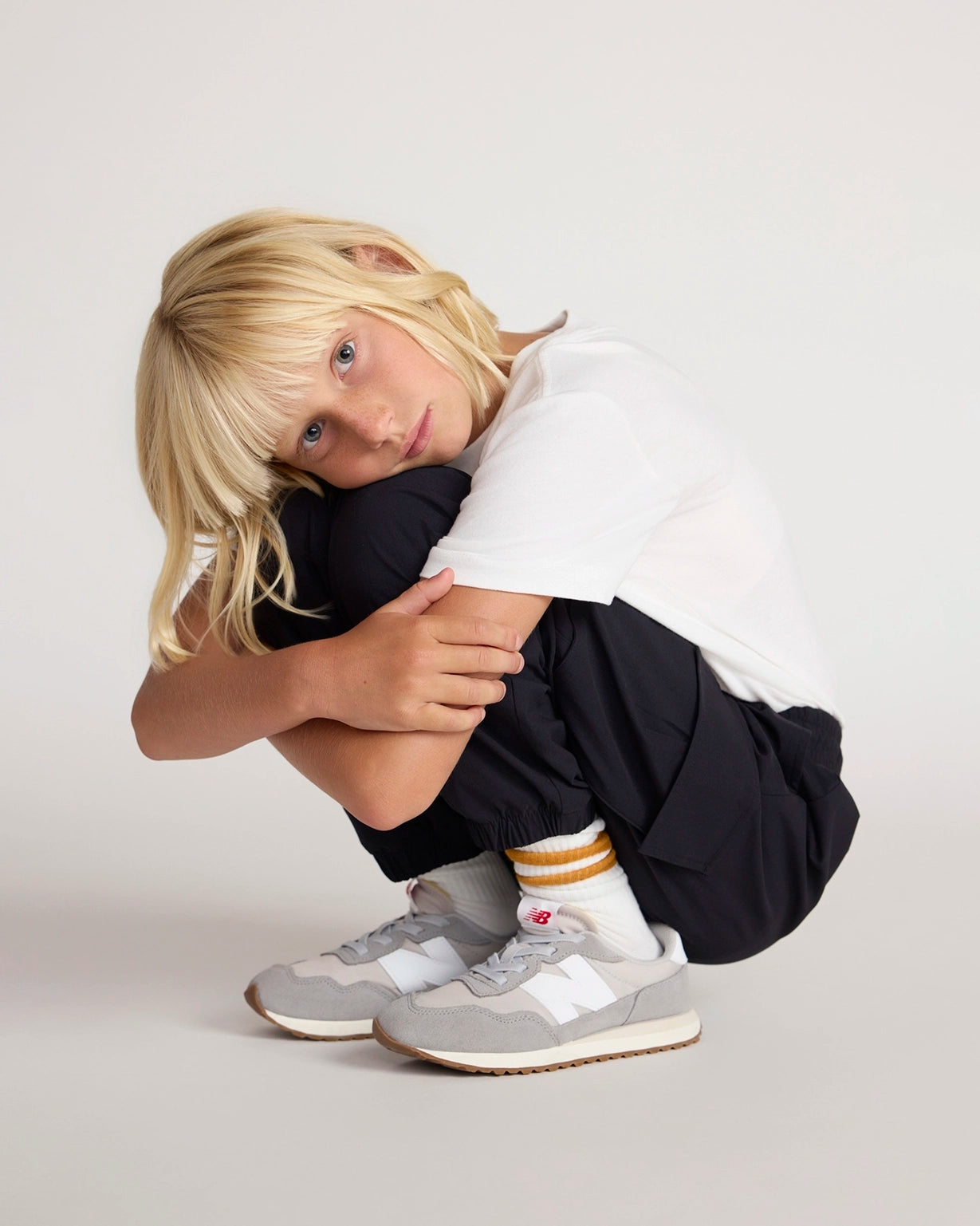 The Kids' Warm Stretch GRS Certified Recycled Nylon Cargo Pant - Black