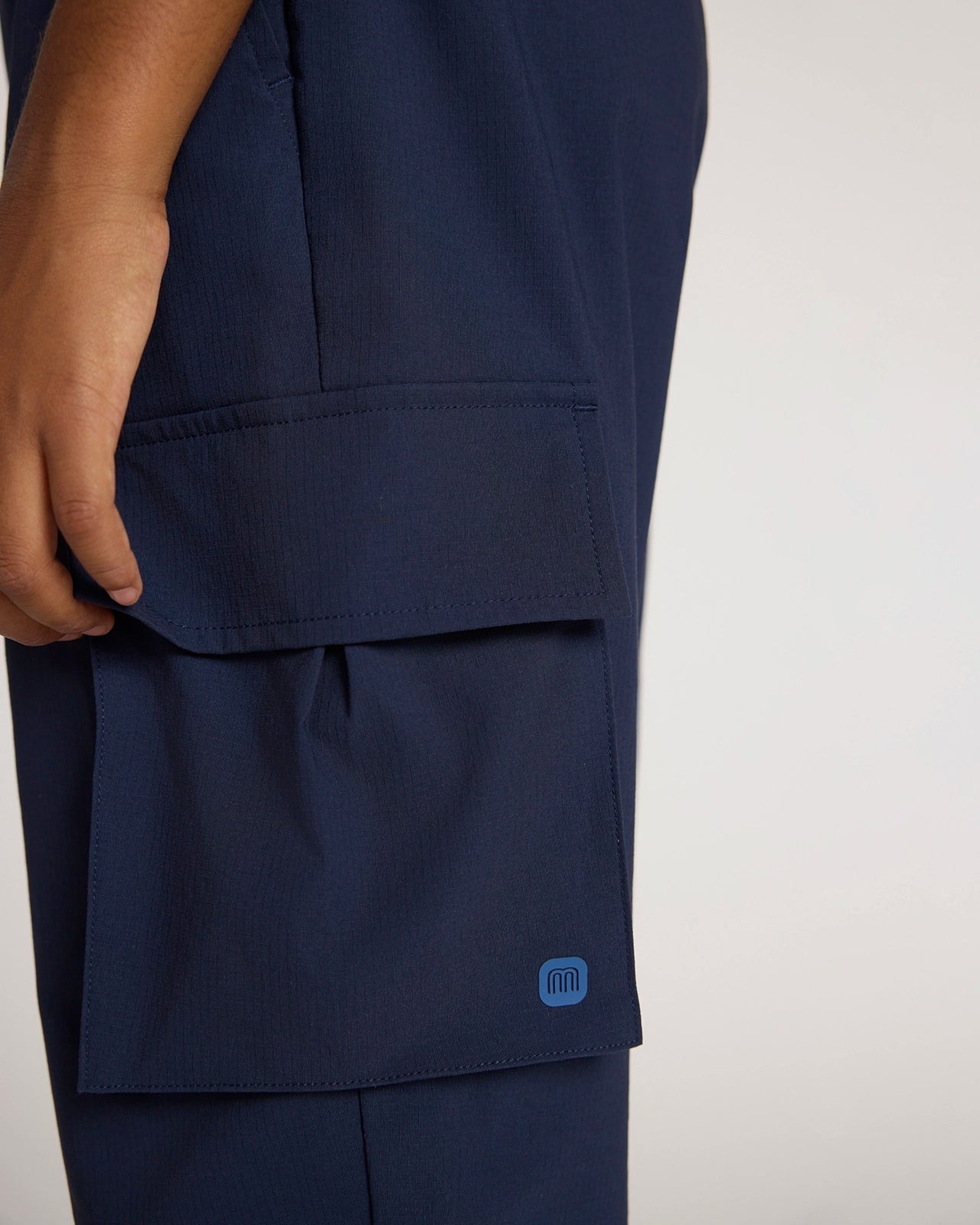The Kids' Warm Stretch GRS Certified Recycled Nylon Cargo Pant - Navy