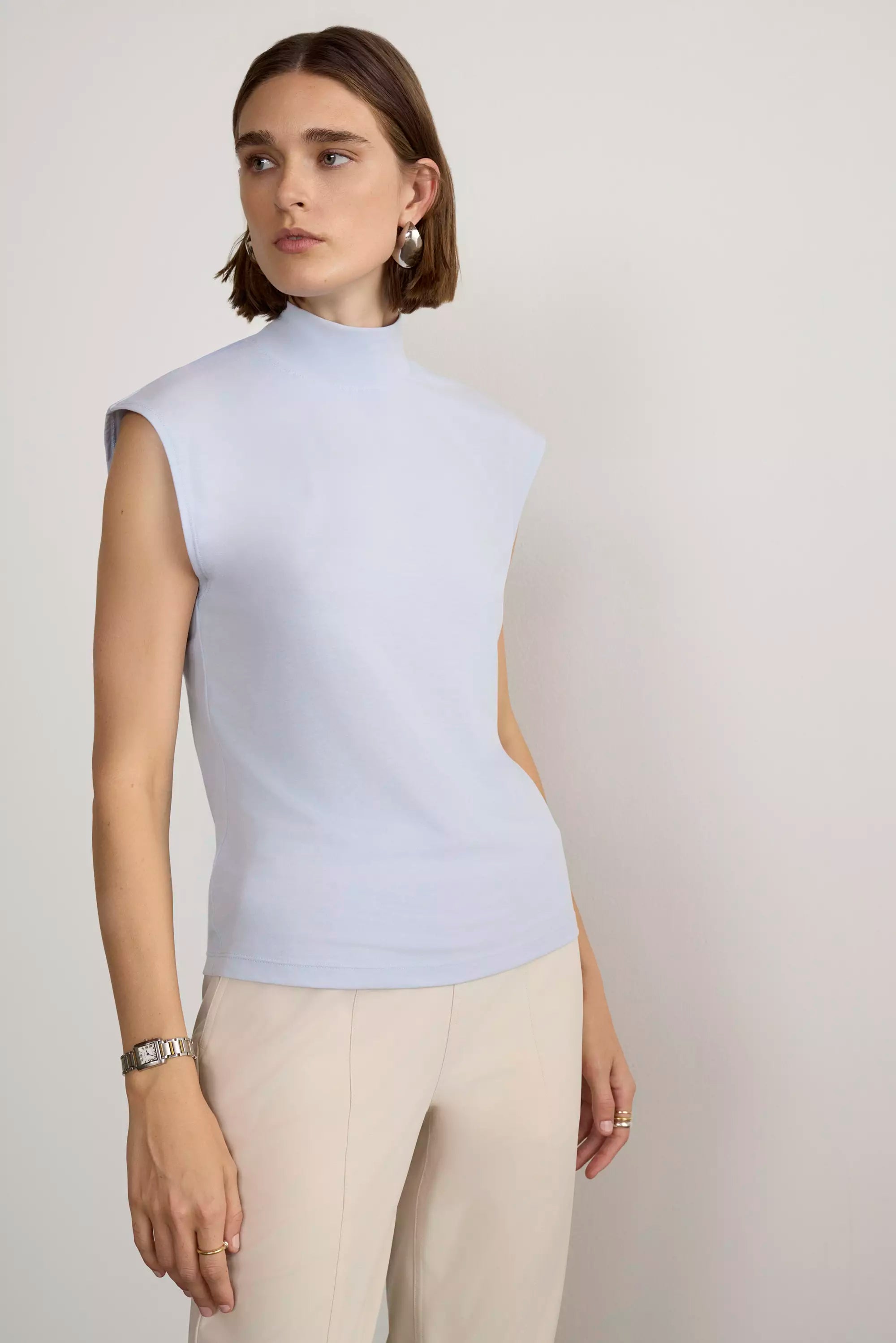 Expression Sleeveless Mock Neck Top