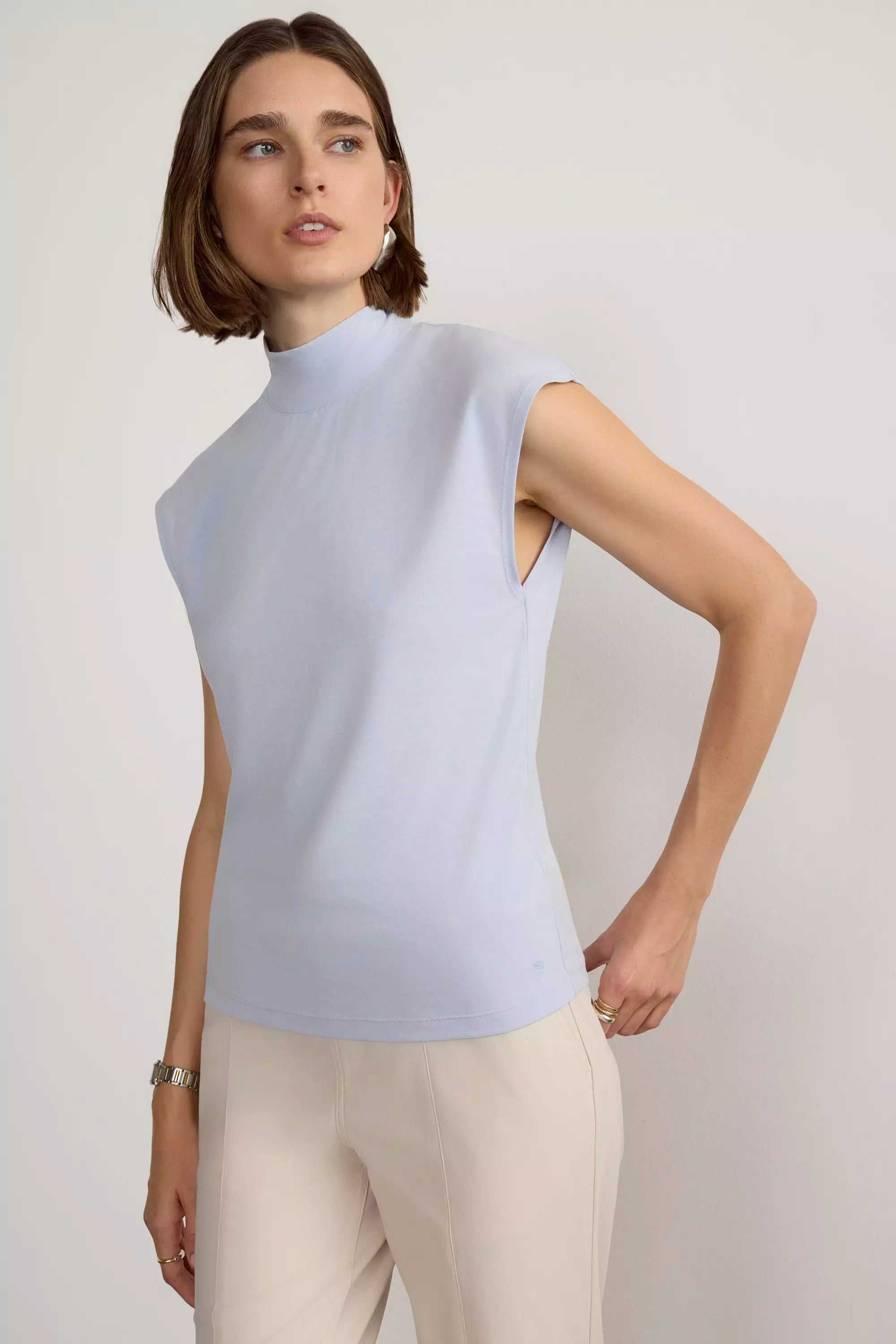 Expression Sleeveless Mock Neck Top