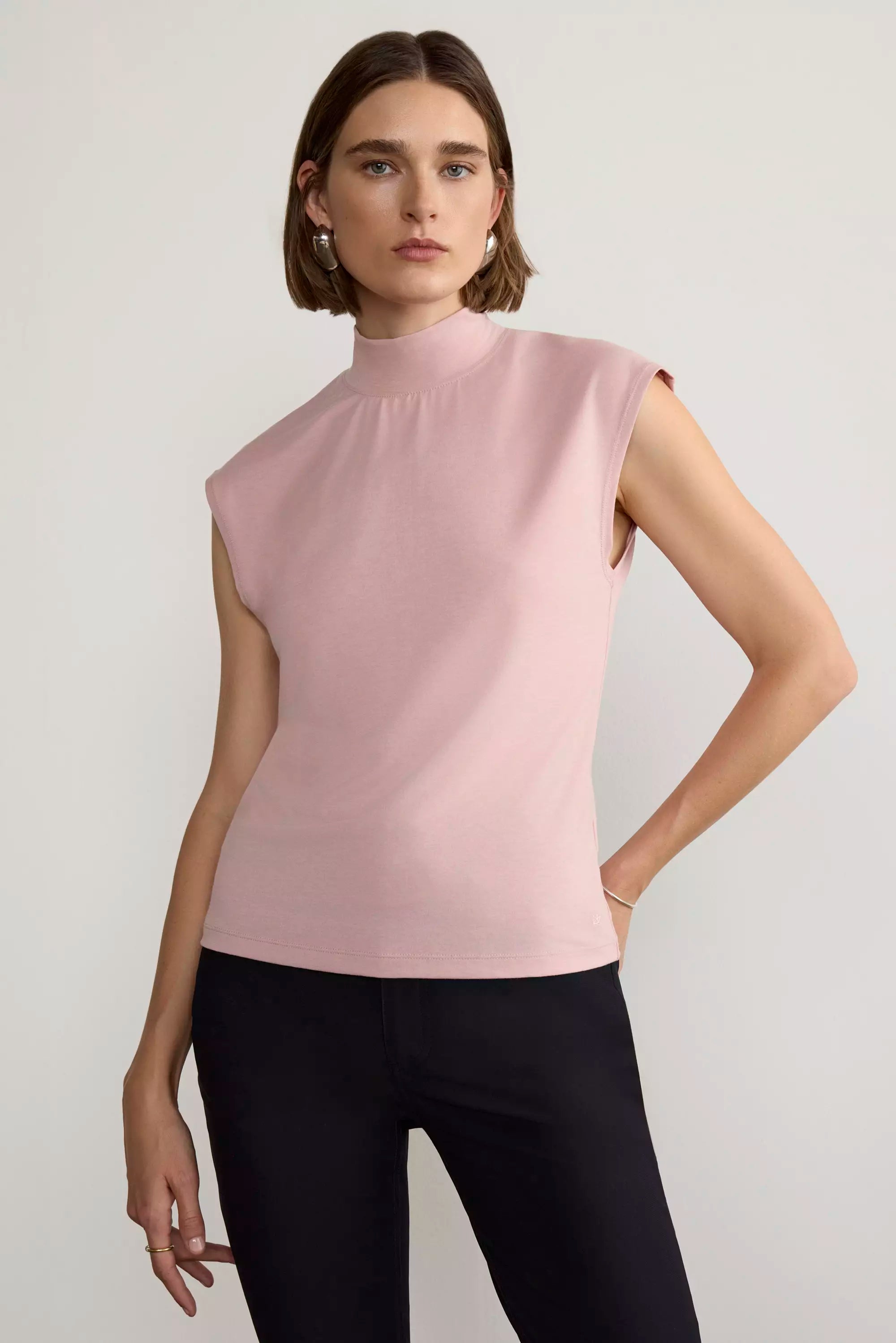 Expression Sleeveless Mock Neck Top