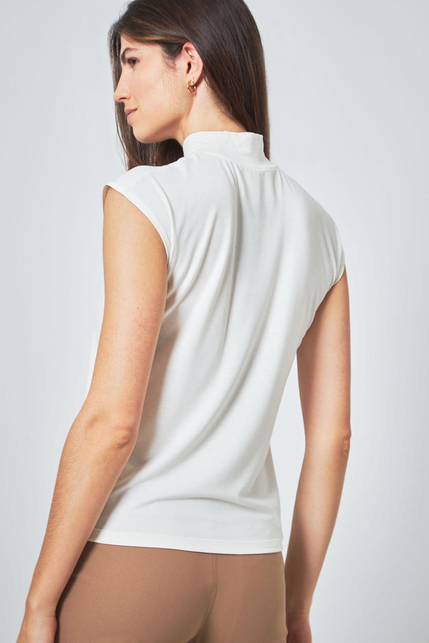 Expression Sleeveless Mock Neck Top